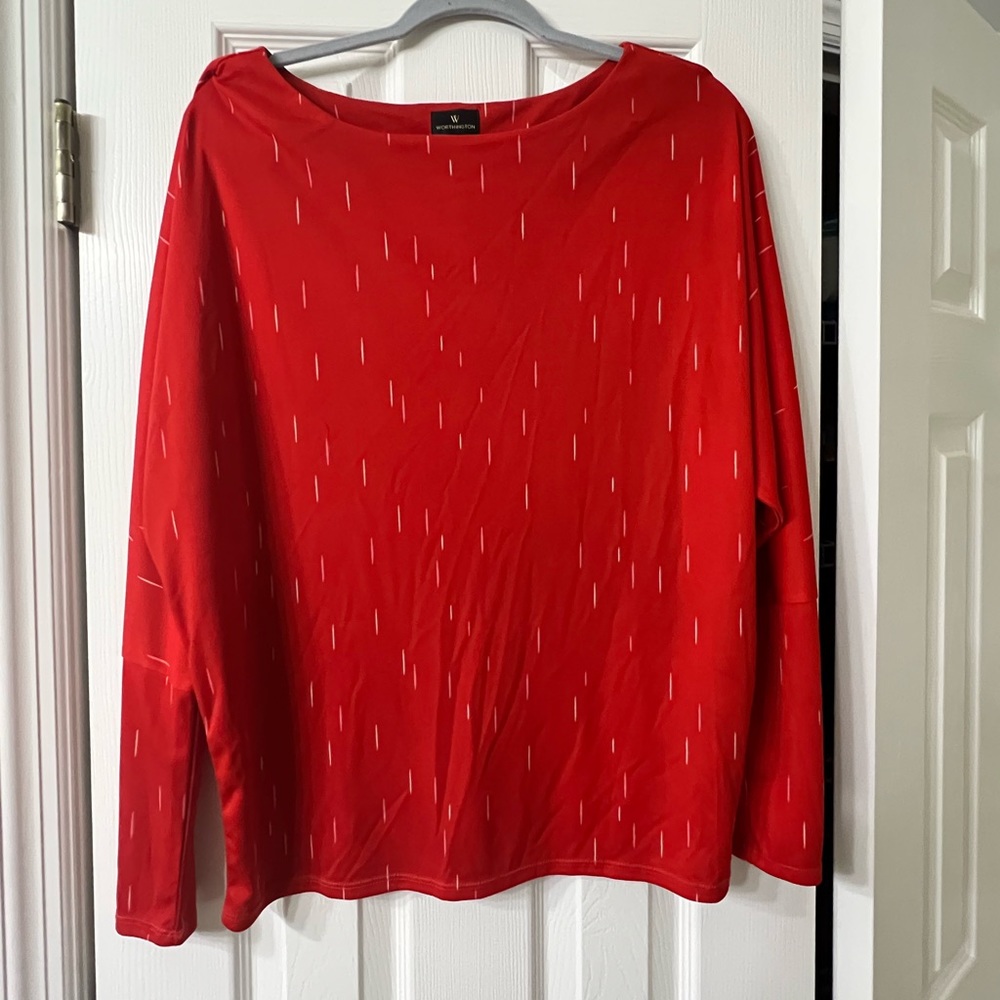 Billowing long sleeve with fitted wrists